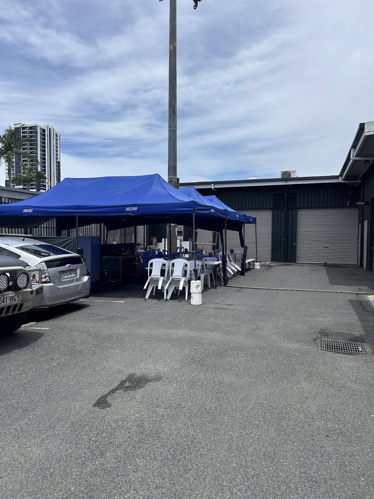 The Brazilian Grill Bites gazebos and tables set up in the car park in Miami